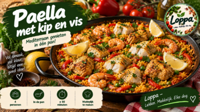 Paella met kip en vis, garnalen, paprika en citroen